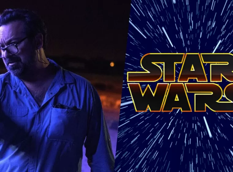 James Mangold is pictured next to the official Star Wars logo
