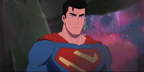Clark Kent standing with a colored background behind him in My Adventures With Superman Season 2 Episode 2 | Agents of Fandom