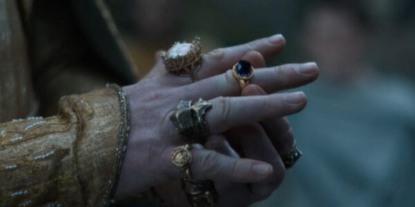 A hand with 5 rings on it on The Rings of Power | Agents of Fandom
