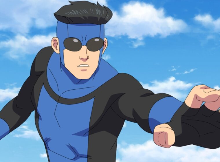 Mark Grayson in his blue and black Invincible suit holding his hand out | Agents of Fandom