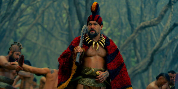 Jason Momoa as Ka'iana holding a club in Chief of War | Agents of Fandom