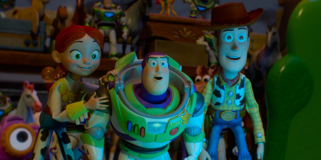 Jessie, Buzz, and Woody looking at Lilypad.