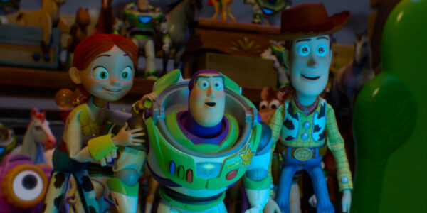 Jessie, Buzz, and Woody looking at Lilypad.
