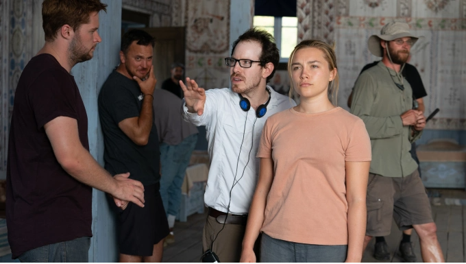 Florence Pugh, right, receives direction from Ari Aster, center, while shooting A24's Midsommar.