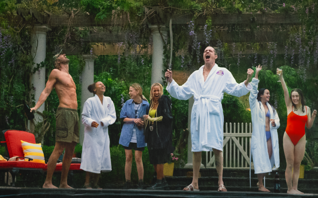 The small but mighty cast prepare for their hurricane party with champagne and robes.