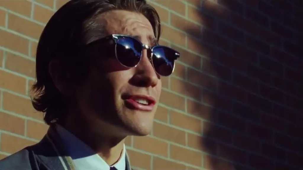Slicked back hair and cool-as-hell sunglasses hide the true menacing nature of Louis Bloom (Jake Gyllenhaal) | Agents of Fandom