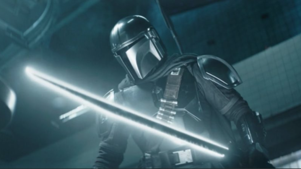 Din Djarin with the Darksaber in The Book of Boba Fett. Image credit: Disney+/ Lucasfilm | Agents of Fandom