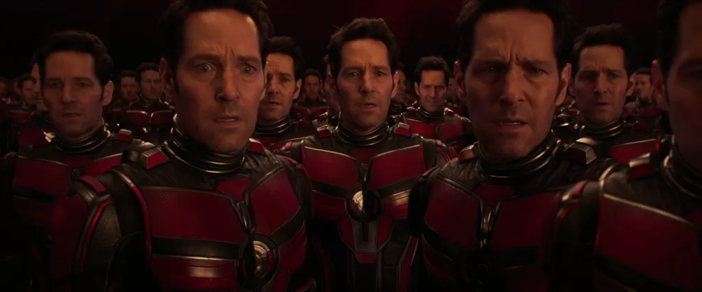 Paul Rudd as Scott Lang/Ant-Man with a bunch of Ant-Man clones in a scene in Ant-Man and The Wasp: Quantunmania | Agents of Fandom