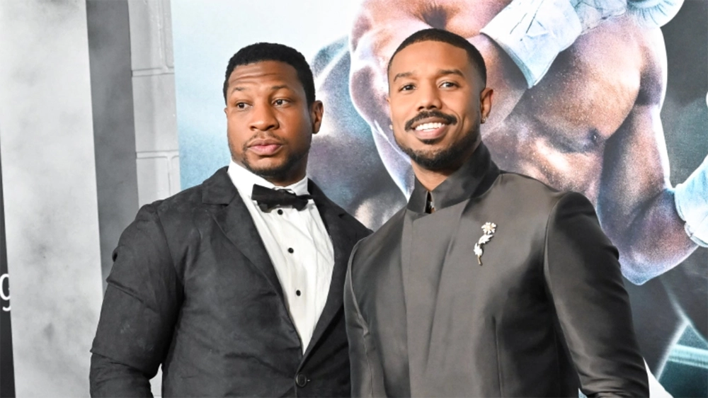 Michael B Jordan and Jonathan Majors at the Creed 3 premier | Agents of Fandom