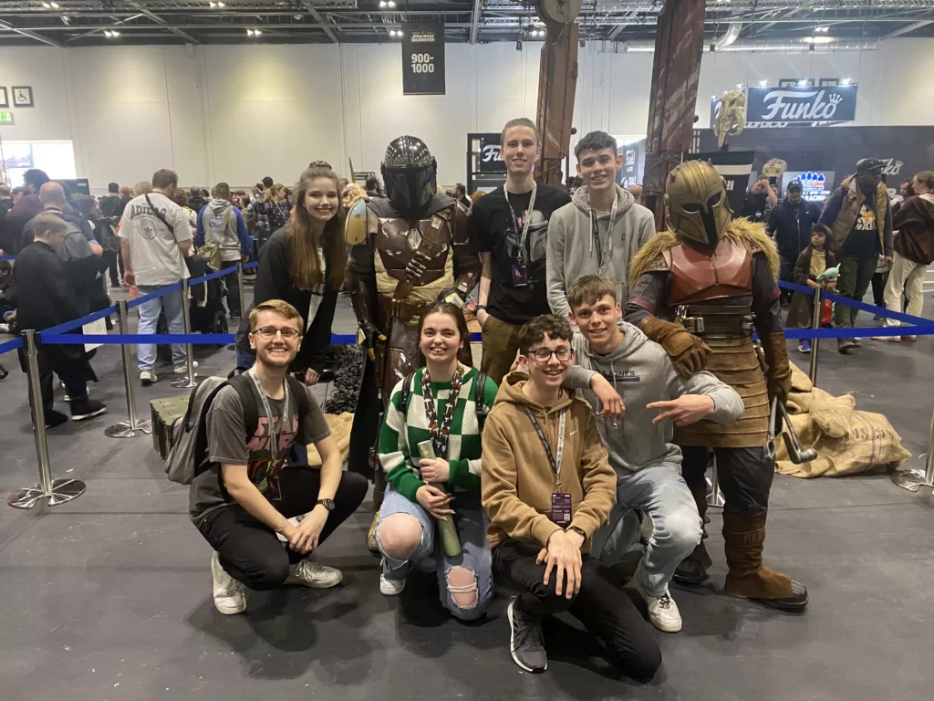 Myself and the friends I spent the day with, alongside The Mandalorian and the Armourer | Agents of Fandom