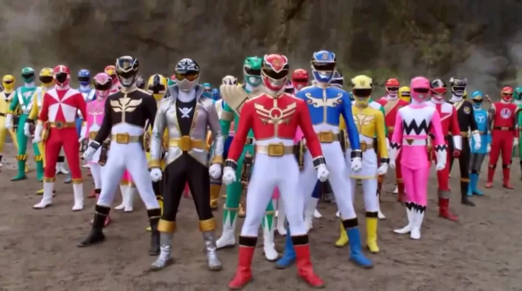 Power Rangers from each of the first 20 seasons of the franchise are featured in this shot from the 20th anniversary episode "Legendary Battle" | Agents of Fandom