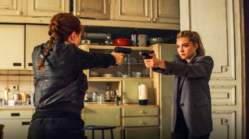 Black Widow (Left) and Yelena Belova (Right) point handguns at one another in top 10 best MCU fight scenes | Agents of Fandom