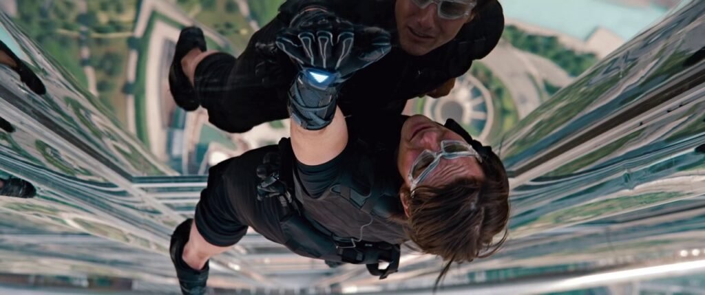 Ethan Hunt (Tom Cruise) scales the Burj Khalifa with high-tech gloves in Mission Impossible Ghost Protocol. I Agents of Fandom