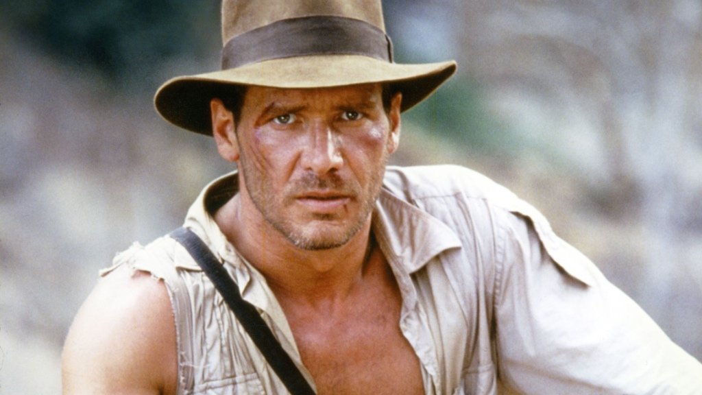 Harrison Ford stars in one of the most controversial Indiana Jones movies, 'Indiana Jones and the Temple of Doom.' | Agents of Fandom