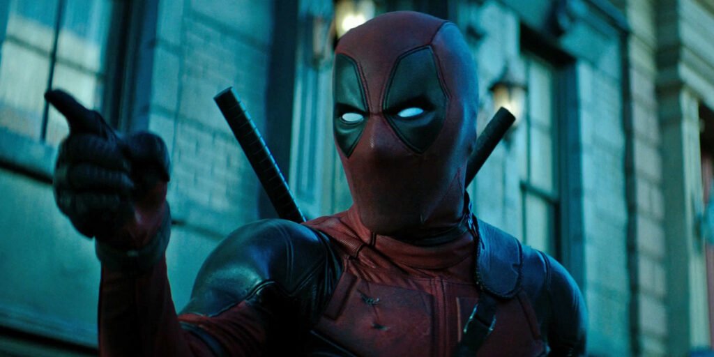 Ryan Reynolds as Deadpool pointing a finger in a scene in Deadpool 2 | Spider-Man team-ups | Agents of Fandom