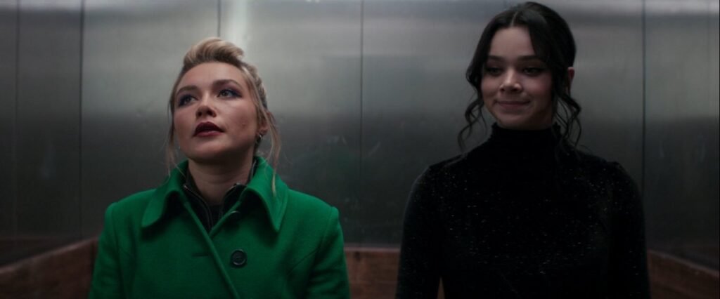 Florence Pugh and Hailee Steinfeld as Yelena Belova and Kate Bishop in the elevator scene in Hawkeye | Spider-Man team-ups | Agents of Fandom