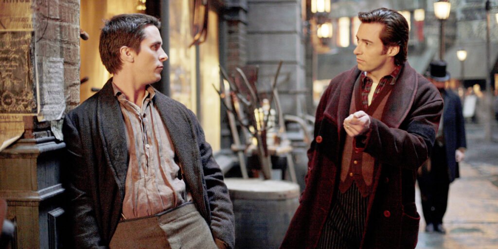 Christian Bale and Hugh Jackman talking in the street in The Prestige | Agents of Fandom