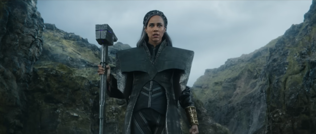Zawe Ashton as Dar-Benn, holding The Universal Weapon as well as one of the Quantum Bands | Agents of Fandom