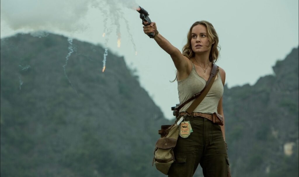 Brie Larson as Mason Weaver shooting a flare gun in Kong: Skull Island | Brie Larson movies | Agents of Fandom