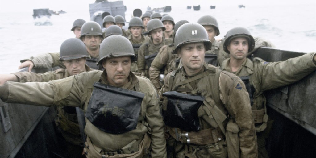Tom Sizemore as Sergeant Horvath and Tom Hanks as Captain Miller preparing to depart the boat on D-Day in Saving Private Ryan | Agents of Fandom