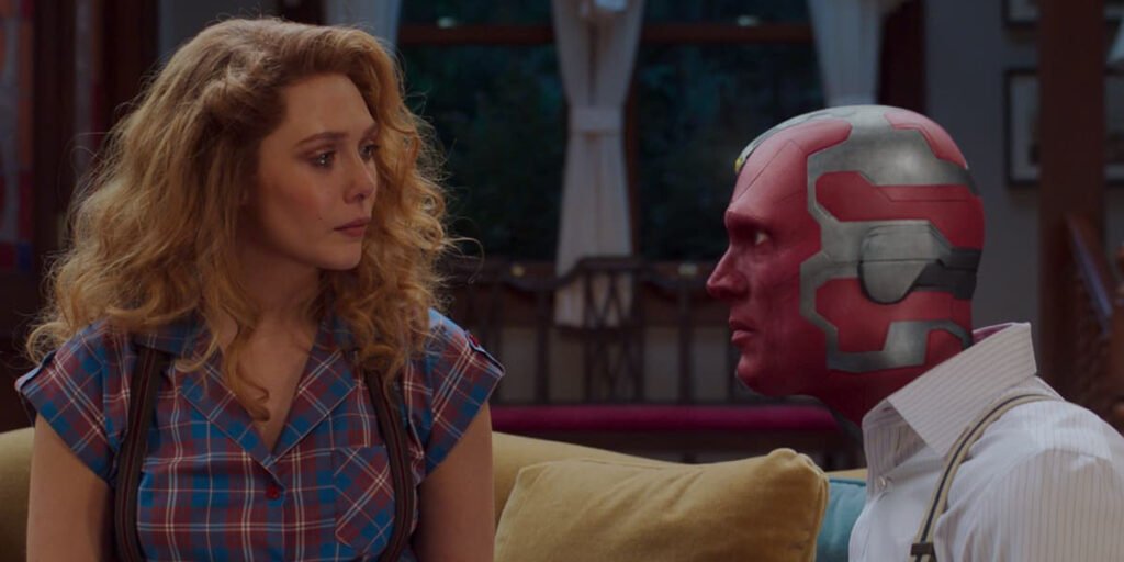 Vision (Paul Bettany) confronts Wanda (Elizabeth Olsen) about the strange occurrences in town in the MCU Disney+ series 'WandaVision' | Agents of Fandom
