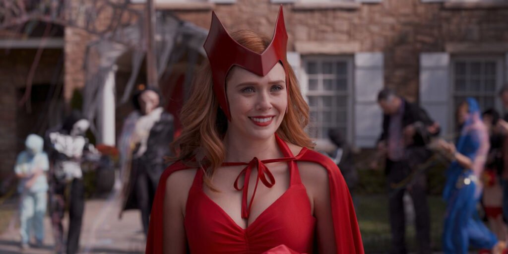 Wanda Maximoff (Elizabeth Olsen) dons her comic-accurate costume in the Halloween episode of 'WandaVision' | Agents of Fandom