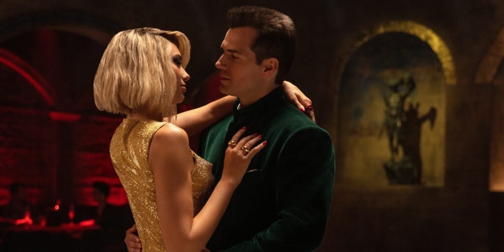 Dua Lipa (left) seductively tangles with Henry Cavill (right) as they dance the night away in Argylle I Agents of Fandom