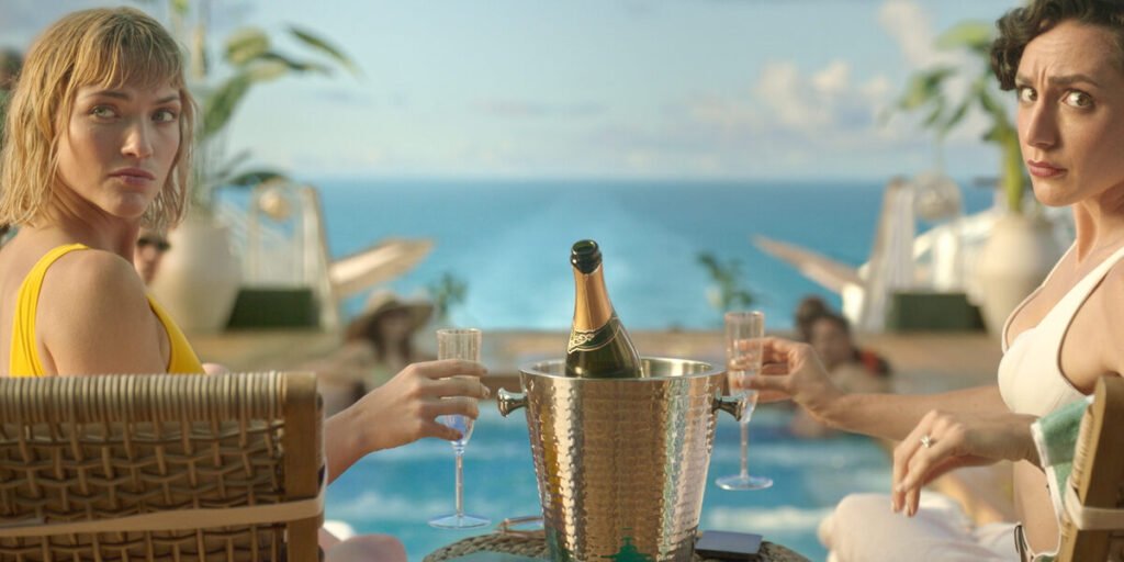 Violett Beane and Lauren Patten as Imogen and Anna as they share a glass of champagne by the pool in 'Death and Other Details'. | Agents of Fandom