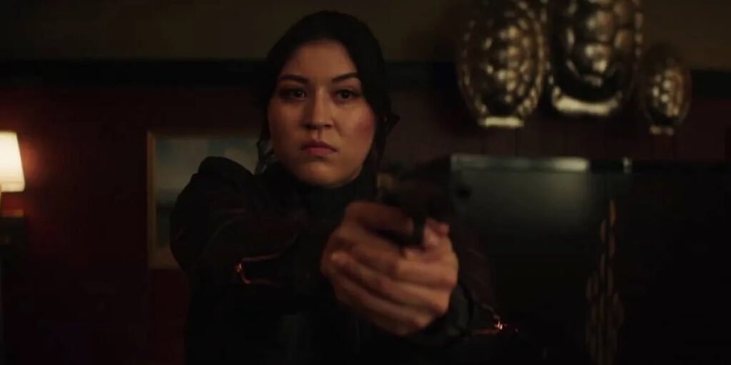 Alaqua Cox as Maya Lopez holding a gun in Echo | Agents of Fandom