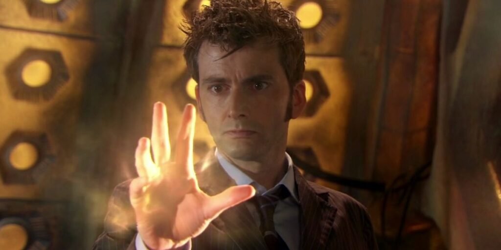 David Tennant's Tenth Doctor just before his regeneration staring at his glowing hand | Agents of Fandom