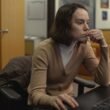 Daisy Ridley using a computer at her desk in Sometimes I Think About Dying | Agents of Fandom