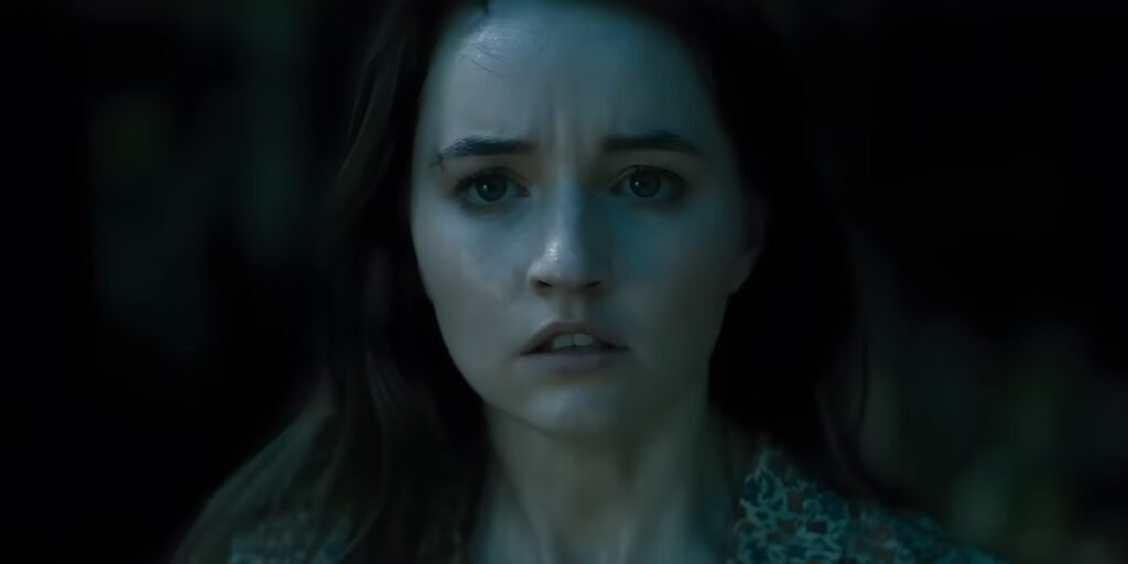 Kaitlyn Dever as Brynn stares forward with a terrified face in No One Will Save You | Agents of Fandom