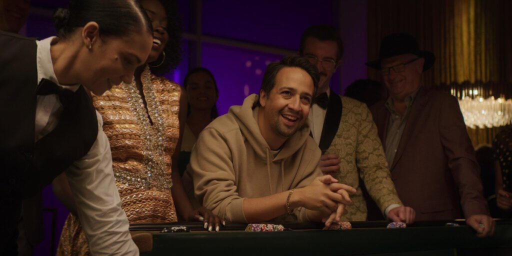 Lin-Manuel Miranda stars as Hermes at the lotus hotel craps table in 'Percy Jackson and the Olympians' Episode 6 | Agents of Fandom