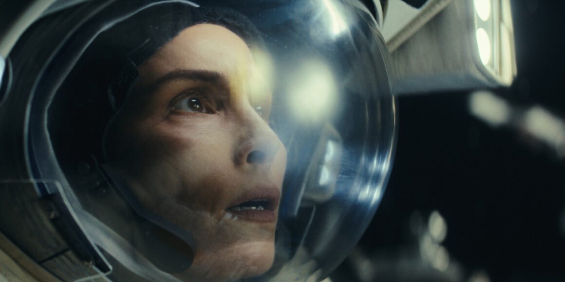 Noomi Rapace as Jo wearing a space helmet in Constellation | Agents of Fandom