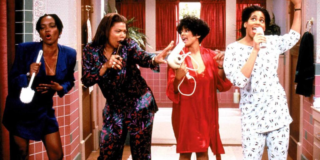 Erika Alexander, Queen Latifah, Kim Fields, and Kim Coles sing in a bathroom in a scene from 'Living Single' | Agents of Fandom