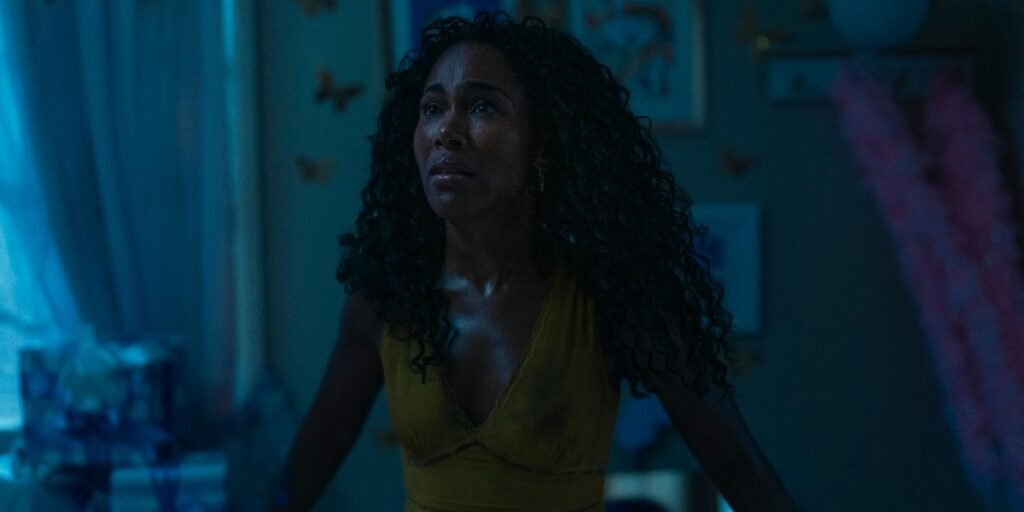 DeWanda Wise as Jessica looking frightened in her childhood bedroom in Imaginary (2024) | Agents of Fandom