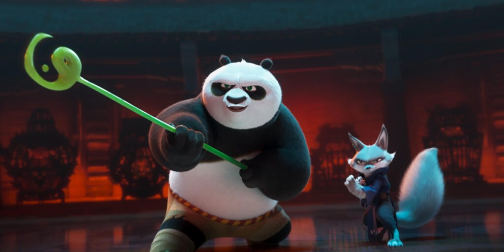 Jack Black holding his jade staff as Po next to Awkwafina's Zhen | Agents of Fandom