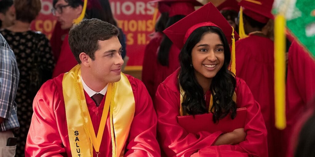 Devi from Never Have I Ever sits with her boyfriend at their High School graduation | Agents of Fandom