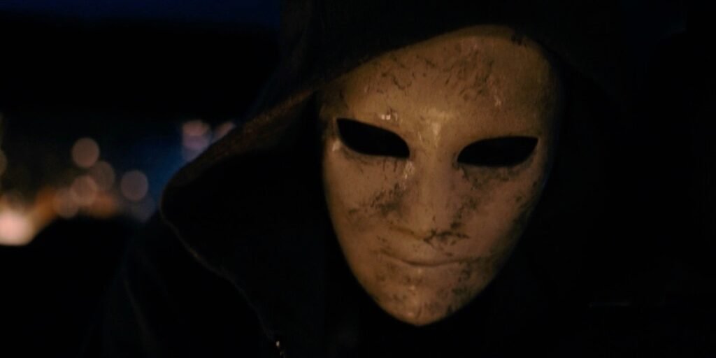 Jason wearing a dirty, scraped up white mask in Dark Matter Episode 1 | Agents of Fandom