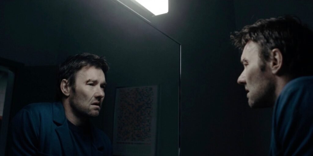Joel Edgerton as Jason Dessen looking at himself in a mirror in Dark Matter Episode 1 | Agents of Fandom