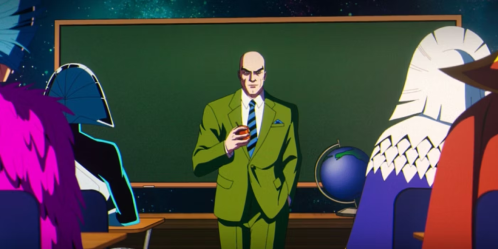 Charles Xavier wearing a suit and holding an apple in front of a chalkboard and addressing the Shi'ar classroom | Agents of Fandom