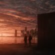 Joel Edgerton and Dayo Okeniyi standing outside the box gazing over the water and skyline in Dark Matter Episode 5 | Agents of Fandom
