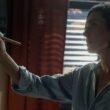 Jennifer Connelly as Daniela Dessen painting with a window behind her in Dark Matter Episode 6 | Agents of Fandom