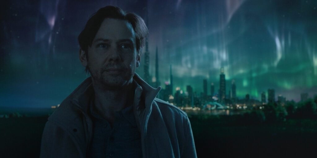 Jimmi Simpson as Ryan Holder standing in front of an alternate Chicago with the Northern Lights overhead in Dark Matter Episode 6 | Agents of Fandom