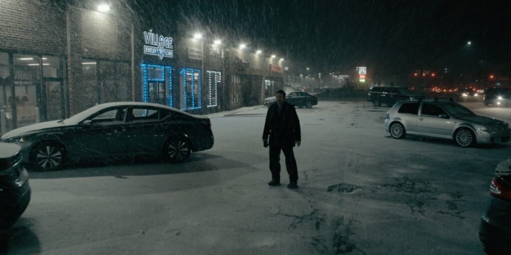 Joel Edgerton standing in a parking lot in the snow in Dark Matter Episode 7 | Agents of Fandom