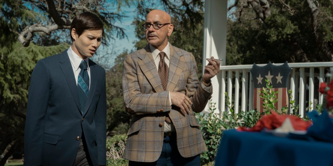 Hoa Xuande's the Captain and Robert Downey Jr.'s Professor Hammer - who is smoking - in the backyard at a get together | Agents of Fandom