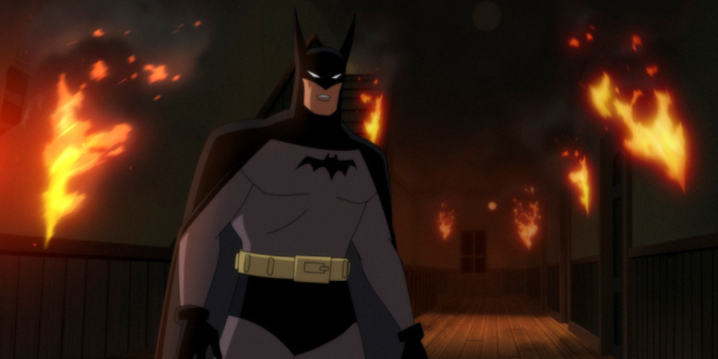 Batman searches the halls of a burning building, searching for anyone trapped inside in Batman: Caped Crusader | Agents of Fandom