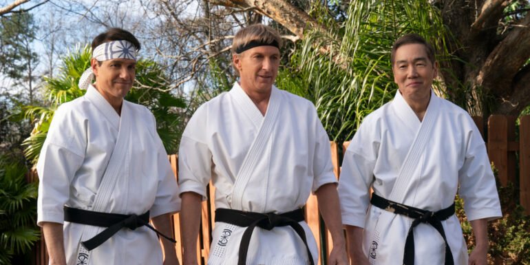 Daniel LaRusso, Johnny Lawrence, and Chozen proudly looking at their students in Cobra Kai Season 6 Episode 1 | Agents of Fandom