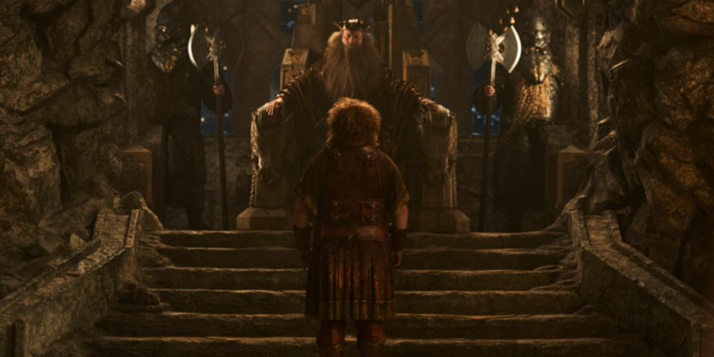 Owain Arthur as Prince Durin IV stands in front of his father, King Durin, in the throne room of Khazad-dǔm in The Lord of the Rings: The Rings of Power Season 2 | Agents of Fandom
