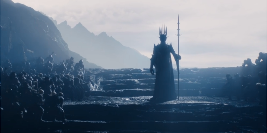 A still image of Sauron in his full armor looking out over Middle-earth from The Lord of the Rings: Rings of Power Season 1 | Agents of Fandom